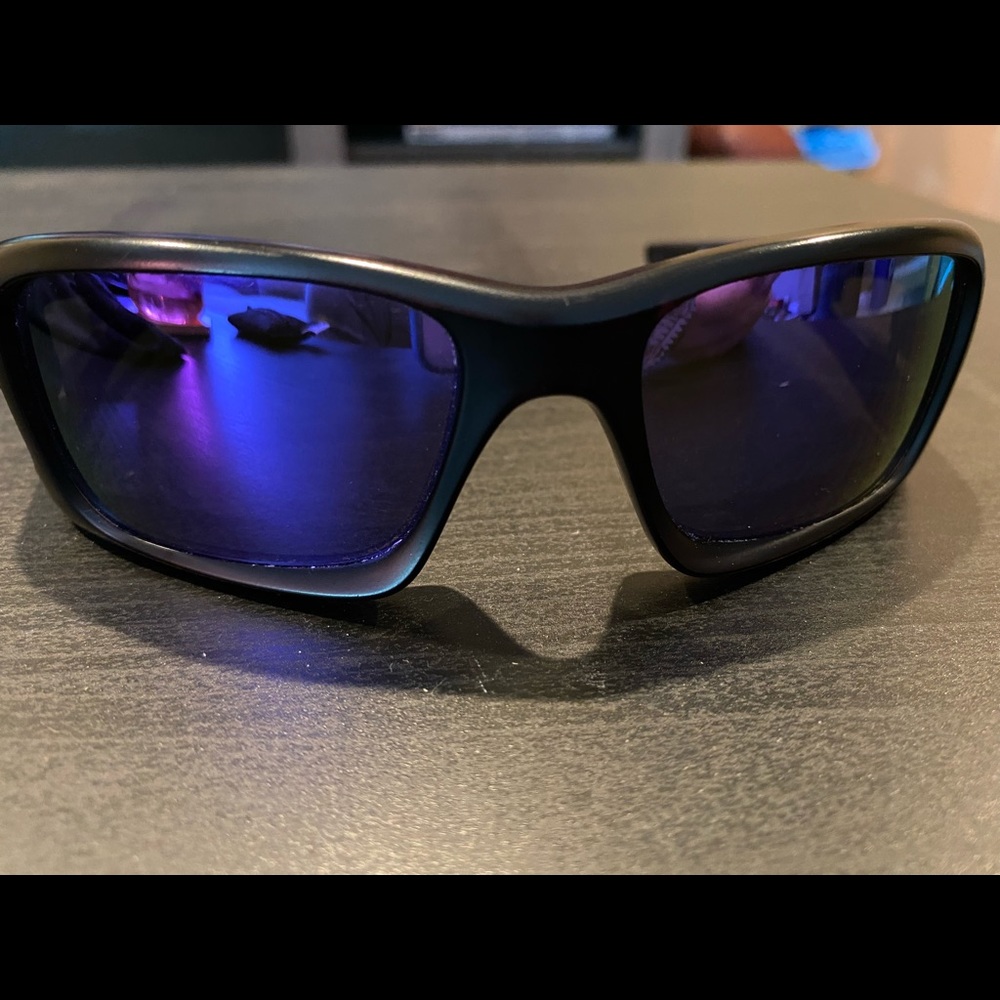 Purple lenses Oakley sunglasses